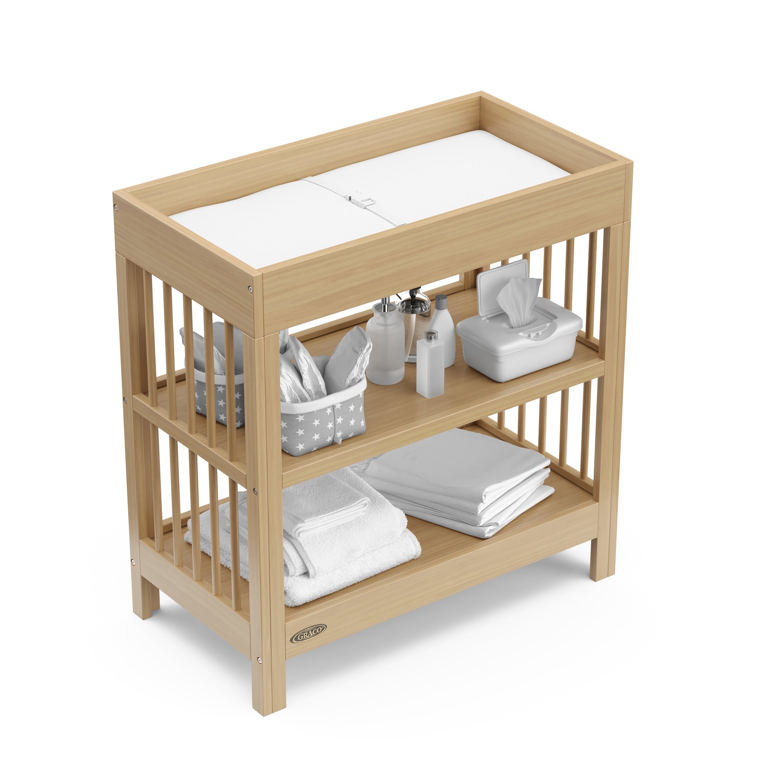 Graco® Teddi® Changing Table with Bonus Water-Resistant Changing Pad.