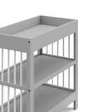 Graco® Teddi® Changing Table with Bonus Water-Resistant Changing Pad.