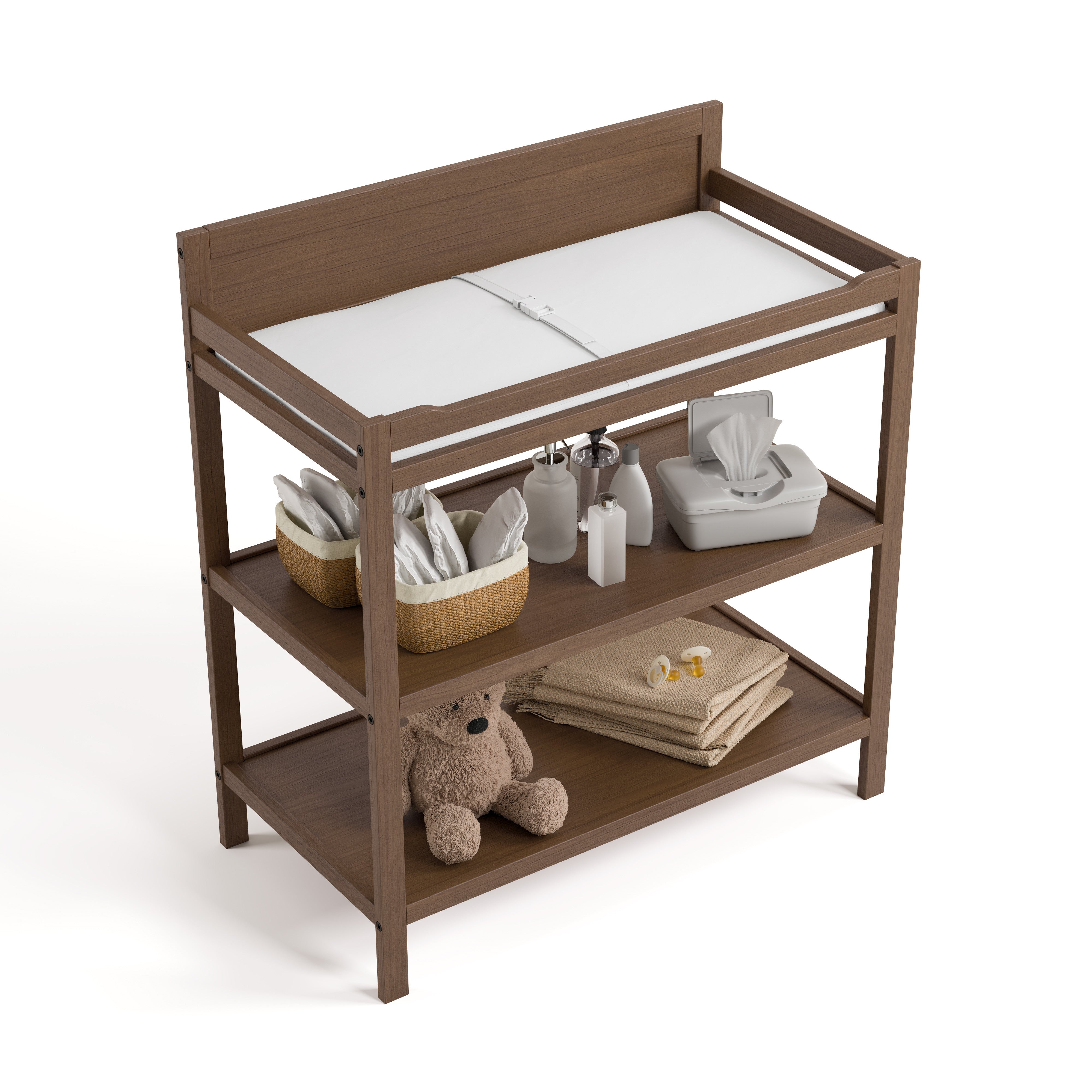 Top view of Alpine changing table in hazelnut with changing essentials on both shelves