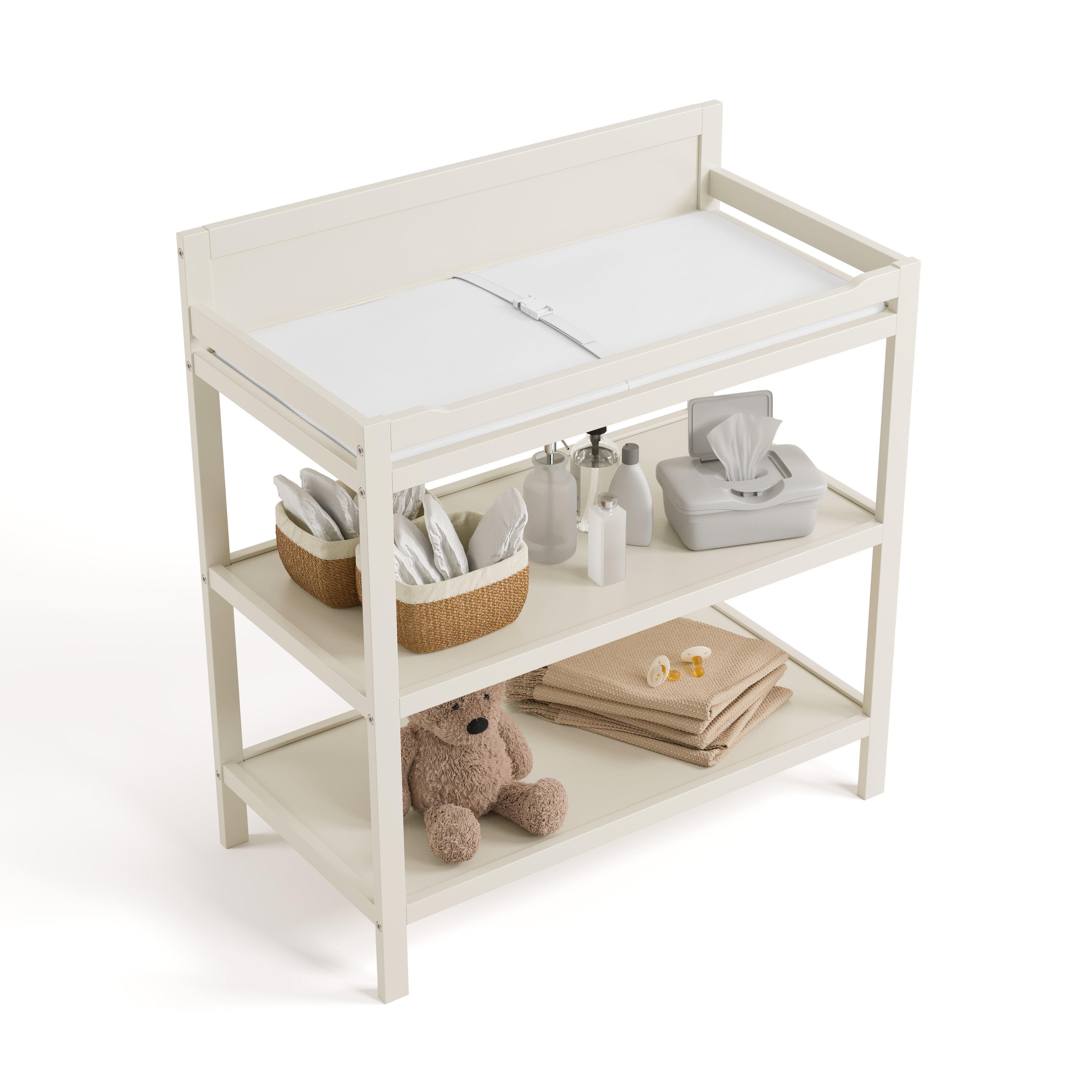 Top view of Alpine changing table in frosted oat with changing essentials on both shelves