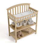 Graco driftwood changing table top view with baby items on bottom shelves