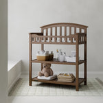 Graco hazelnut changing table in nursery