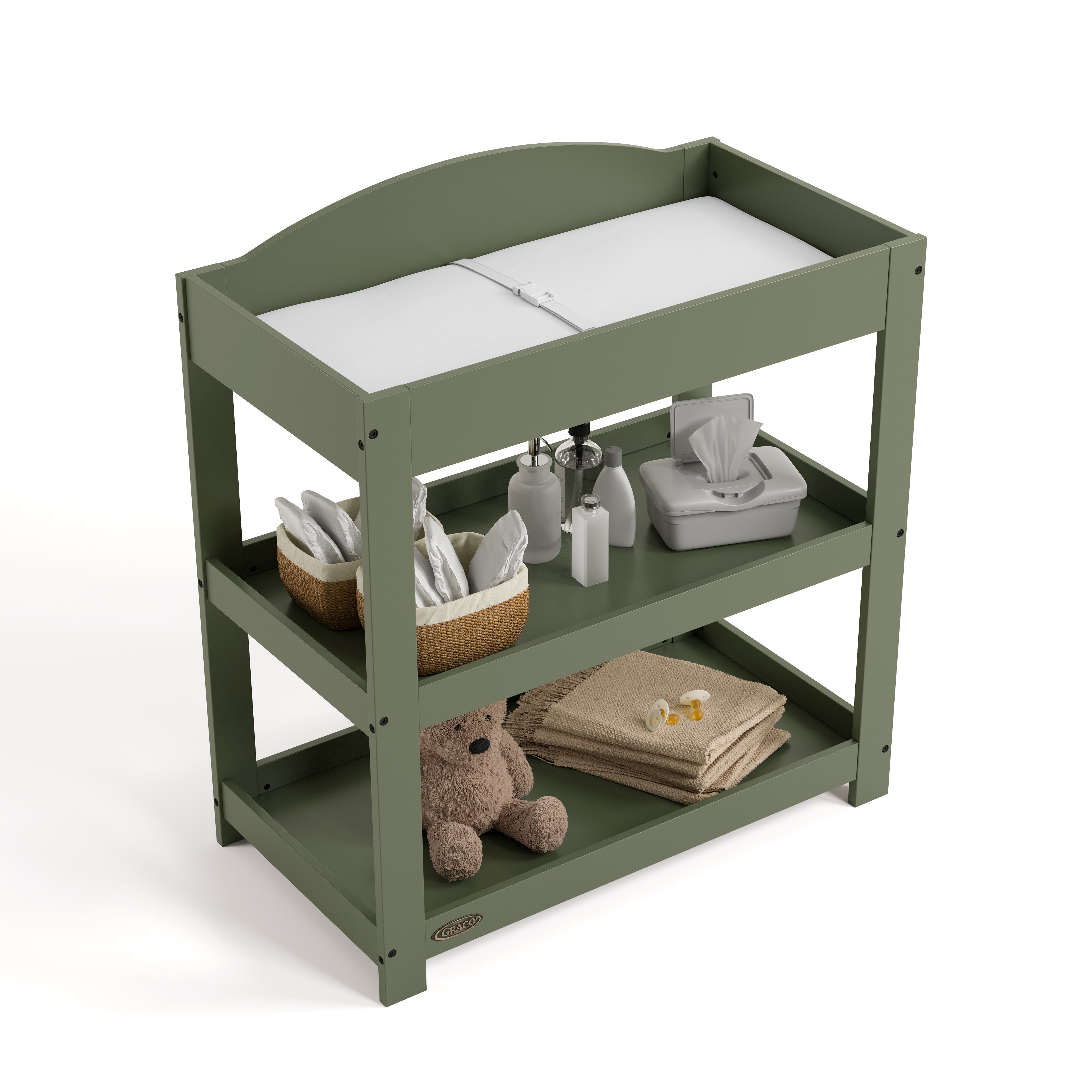 Graco olive customizable changing table top view with baby items on bottom shelves