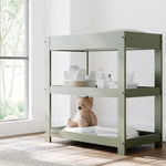 Graco olive customizable changing table in nursery