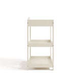 Graco frosted oat customizable changing table side view