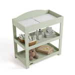 Graco sage customizable changing table top view with baby items on bottom shelves