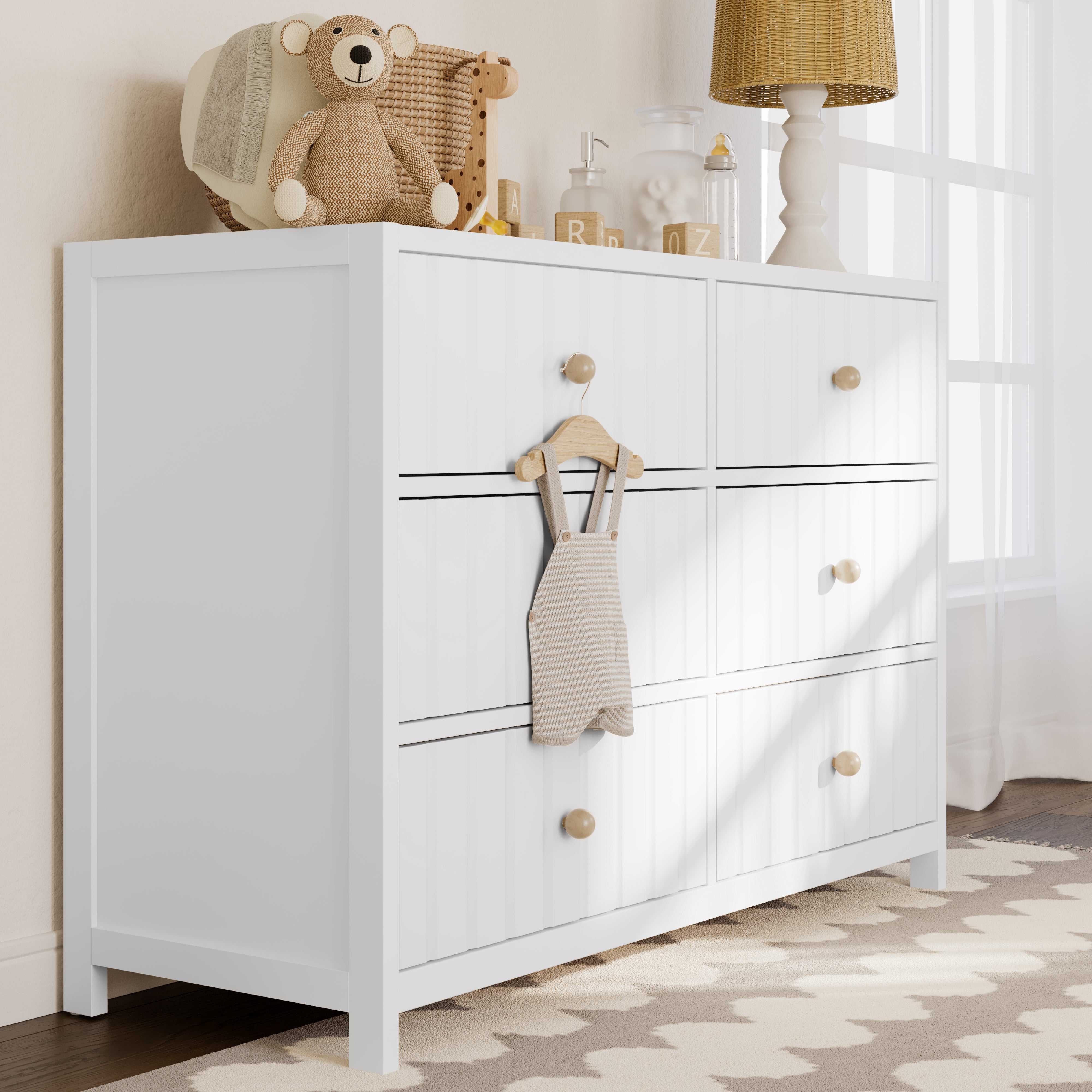 White dresser in nursery setting