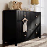 Black dresser in nursery setting