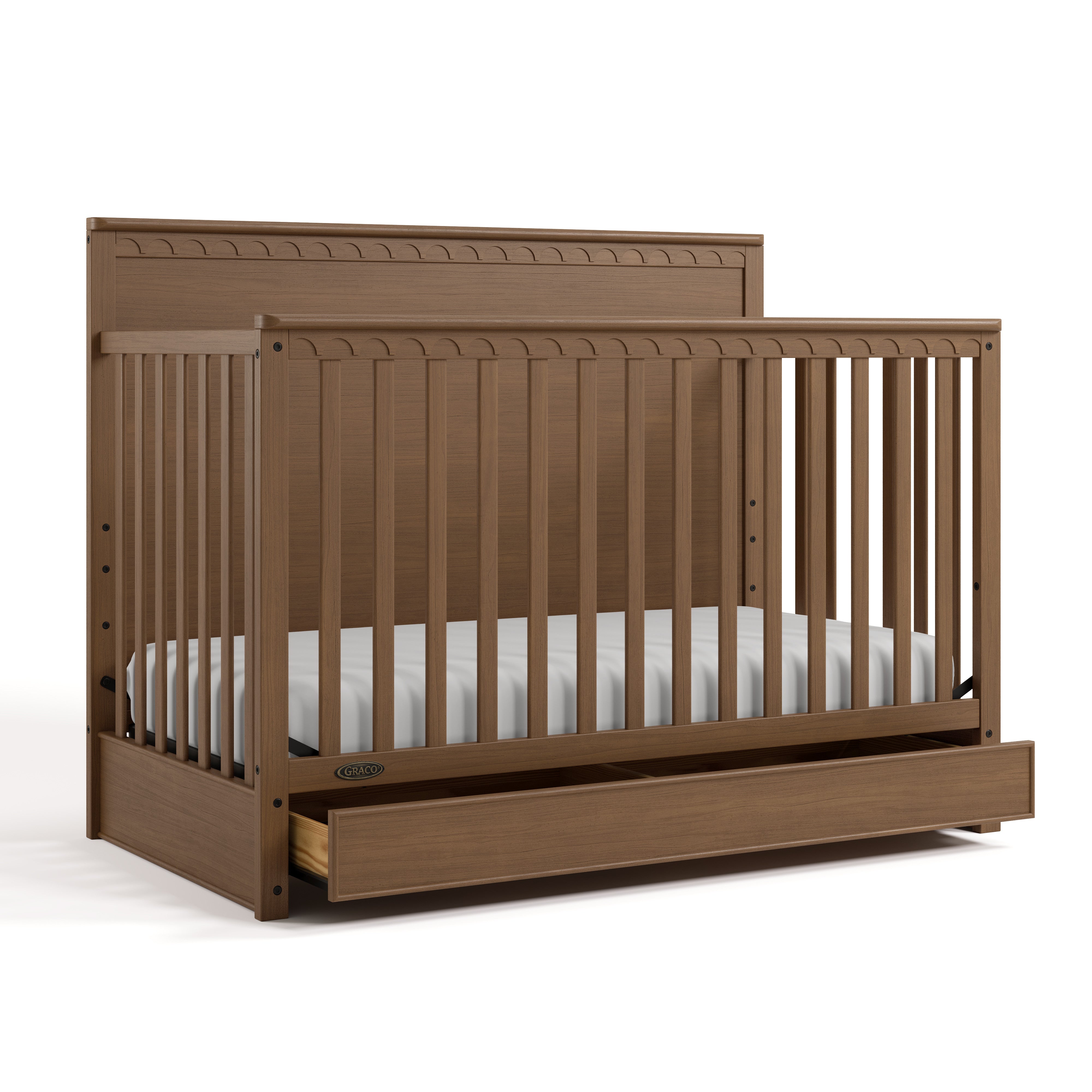 Sasha hazelnut crib with drawer angle view