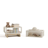 Santorini frosted oat with driftwood bassinet converted to toybox and bookshelf with baby items inside