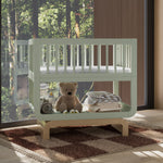 Santorini sage with driftwood bassinet in nursery