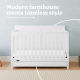 Hadley white crib with drawer in nursery style callout