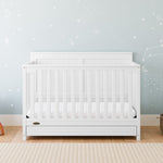 Hadley white crib with drawer in nursery