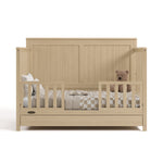 Hadley driftwood crib with drawer converted to toddler bed with two guardrails