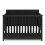 front view of black crib with drawer