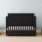Hadley black crib with drawer in nursery