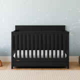 Hadley black crib with drawer in nursery