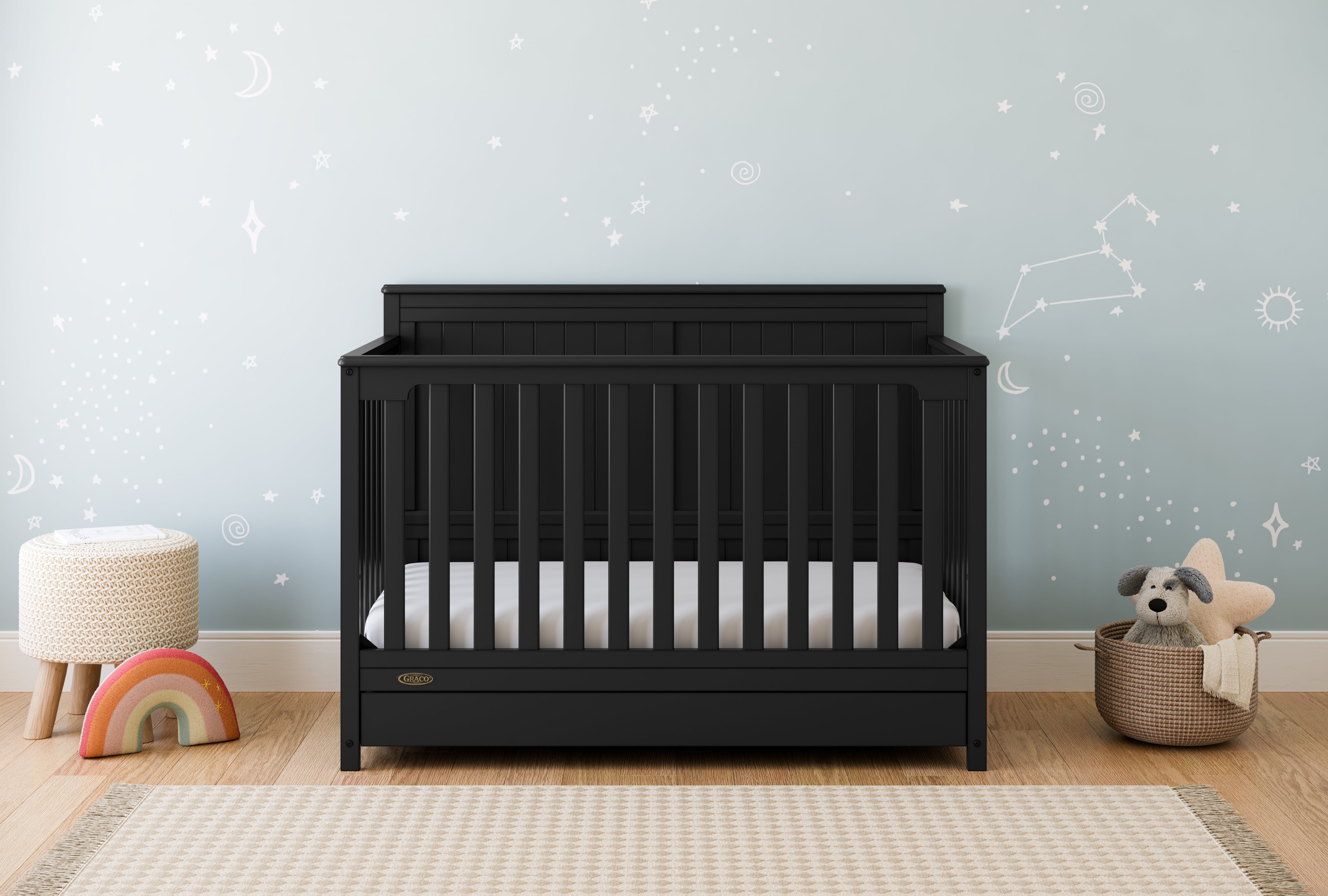Hadley black crib with drawer in nursery