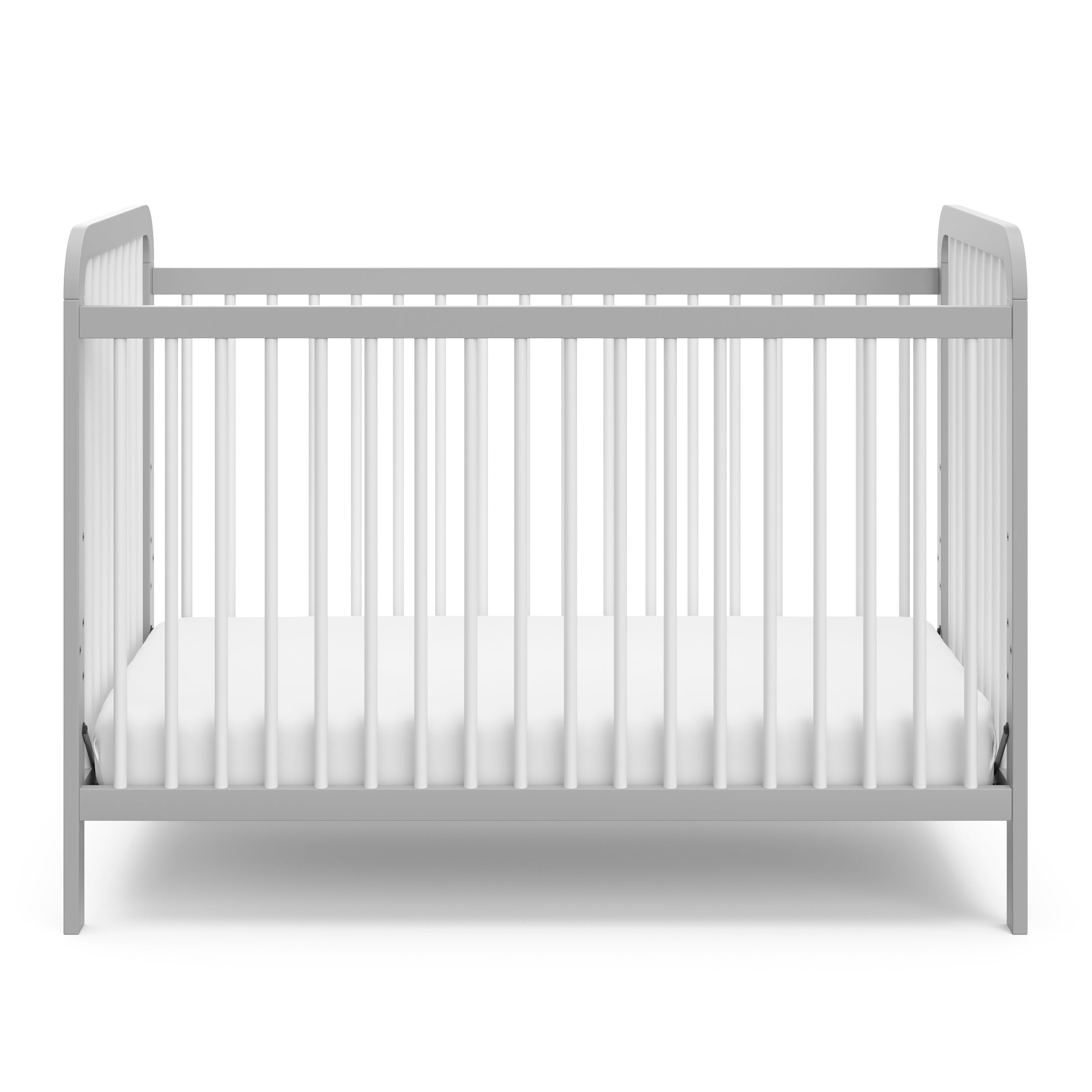 Front view of white crib with pebble gray