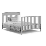 Benton pebble gray crib converted to full-size bed with footboard