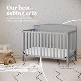 Benton pebble gray crib in nursery best-selling crib callout