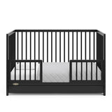 Graco® Teddi® 5-in-1 Convertible Crib with Drawer.