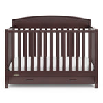 Front view of espresso crib with drawer