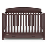 Front view of espresso crib with drawer