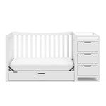 White crib and changer with drawer in toddler bed conversion