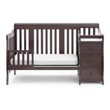 espresso crib in toddler bed conversion with one safety guardrail
