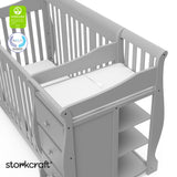 Portofino pebble gray crib and changer with GGG and PTPA logo on top left