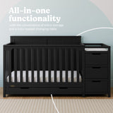 Hadley black crib and changer in nursery