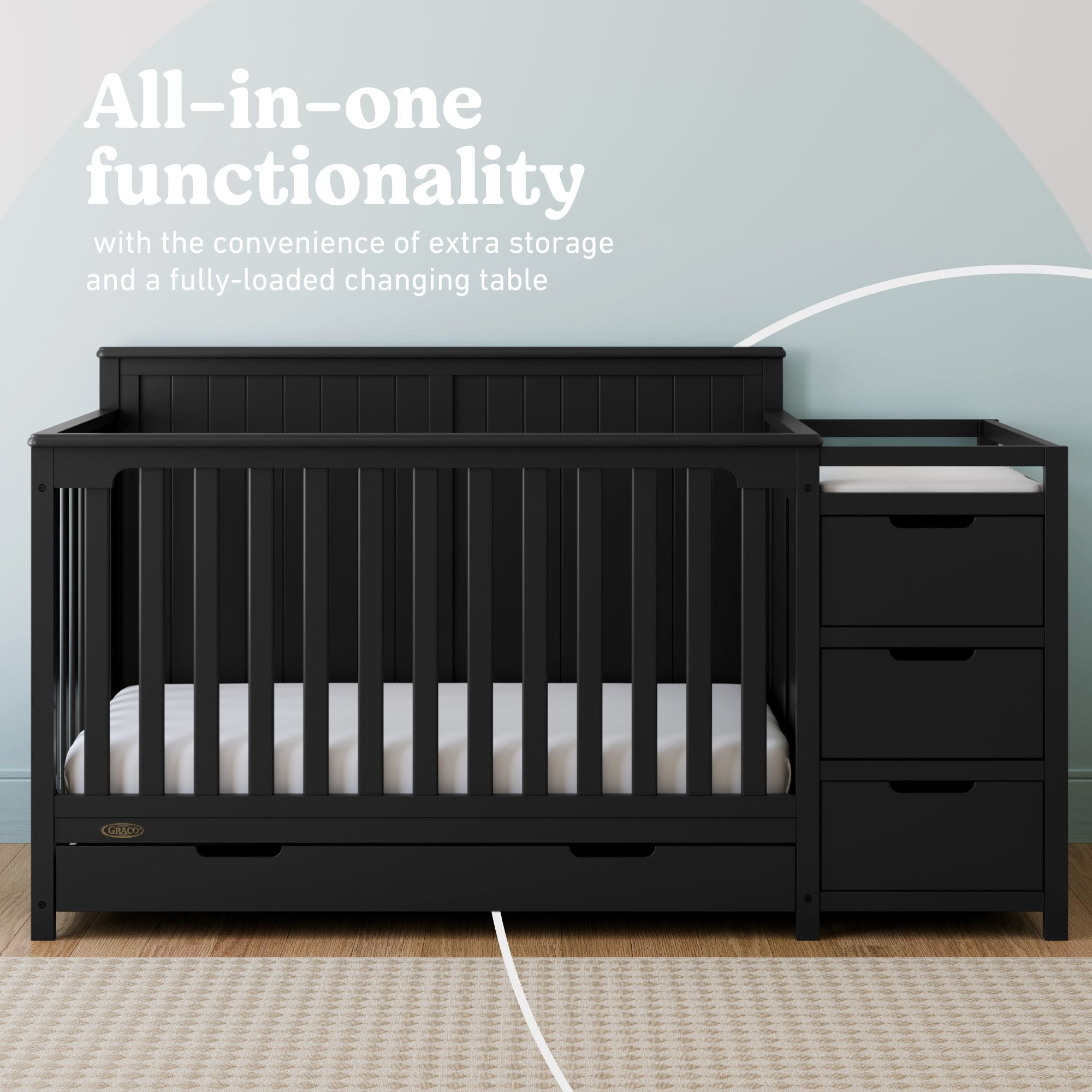 Hadley black crib and changer in nursery