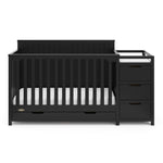 Front view of black crib with drawer and changer with drawer