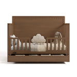 Sasha hazelnut crib with drawer converted to toddler bed with two guardrails