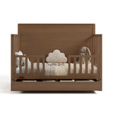 Sasha hazelnut crib with drawer converted to toddler bed with two guardrails