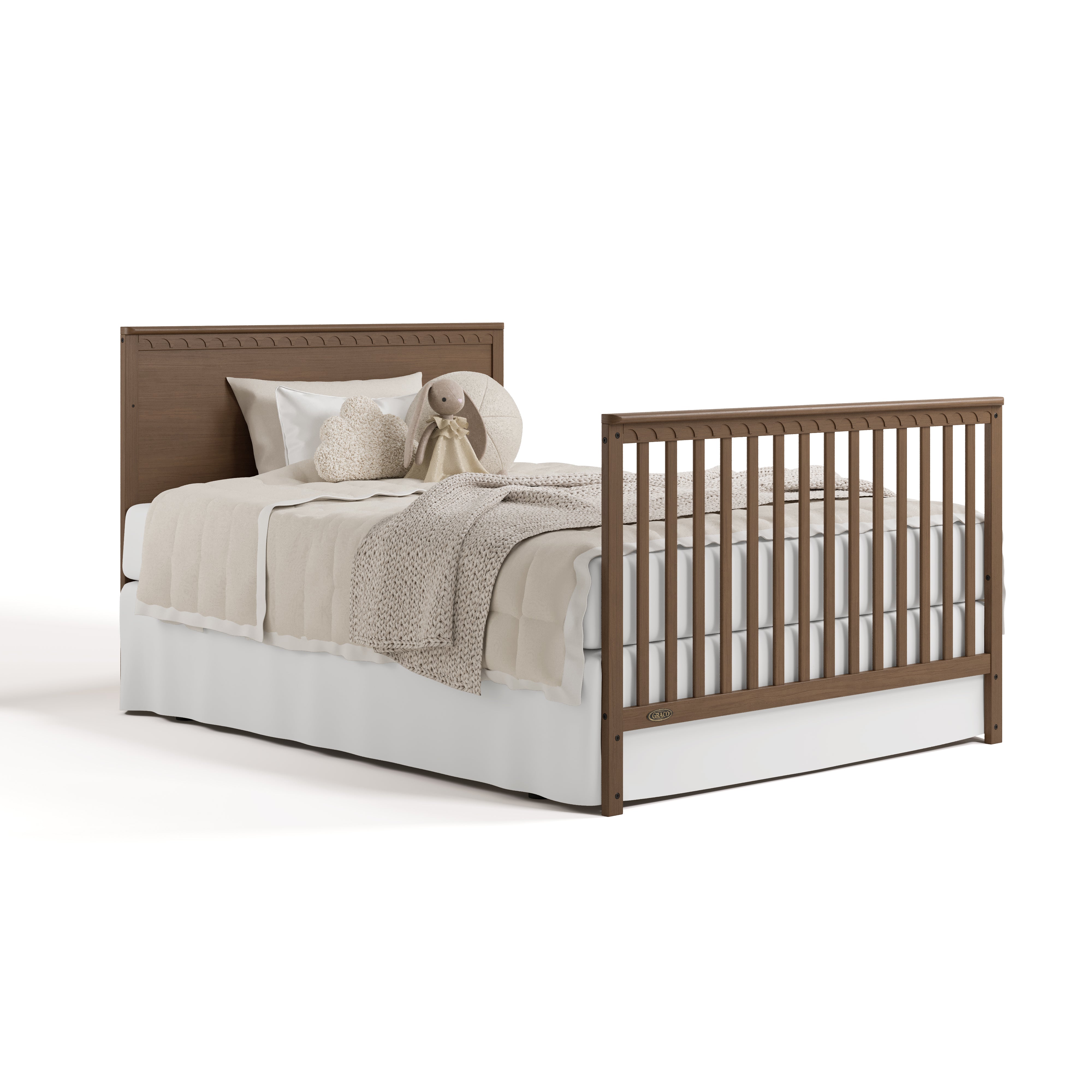 Sasha hazelnut crib with drawer converted to full-size bed with footboard