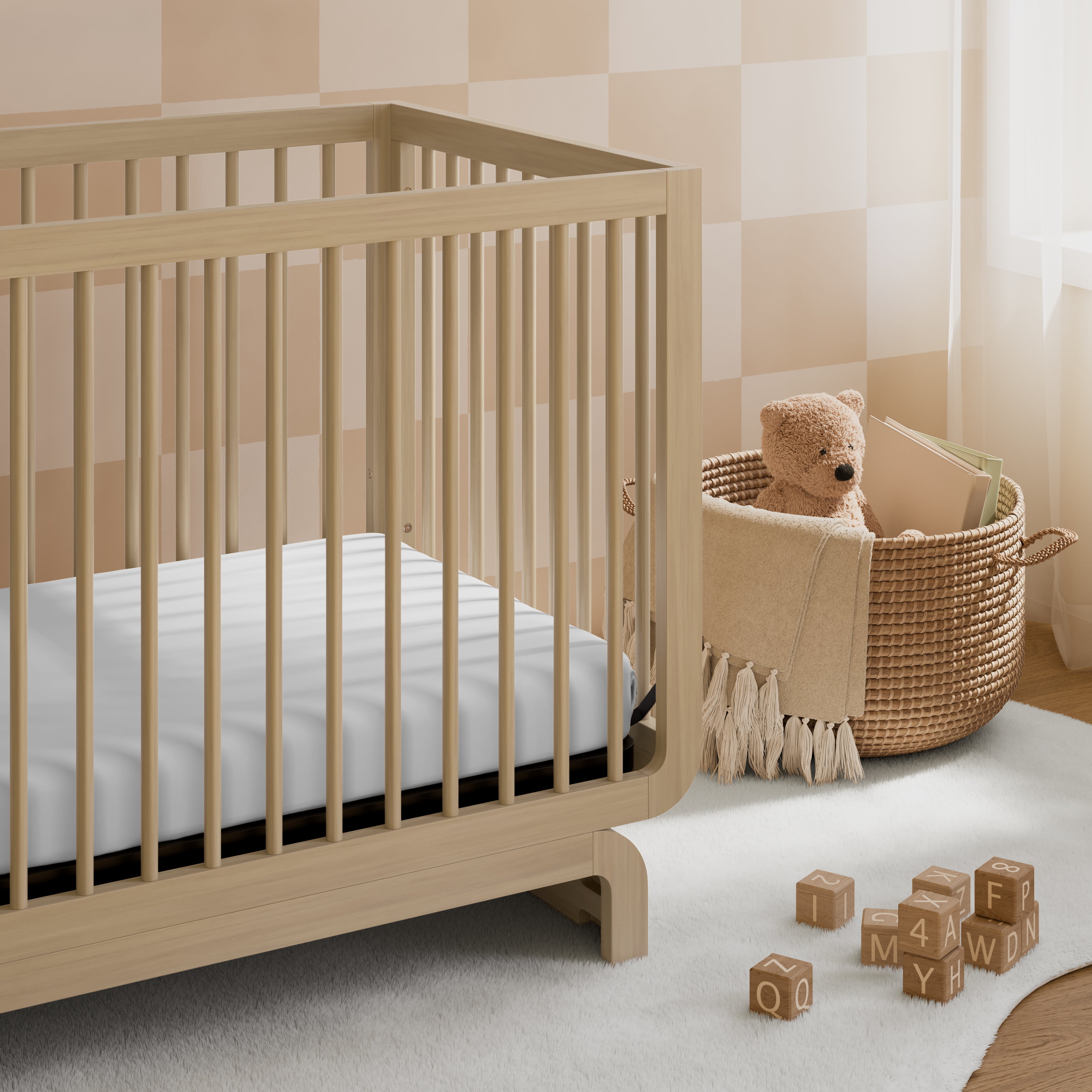 Storkcraft® Santorini® Deluxe 5-in-1 Convertible Crib with Bonus Toddler Guardrail.