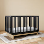 santorini crib black with driftwood in nursery