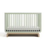 Two-tone sage and natural wood baby crib, at a front-facing angle (Sage with Driftwood)