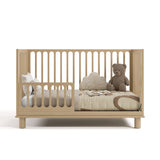 Storkcraft® Sicily™ Deluxe 3-in-1 Convertible Crib with Bonus Toddler Guardrail.