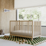 Storkcraft® Sicily™ Deluxe 3-in-1 Convertible Crib with Bonus Toddler Guardrail.