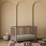 Storkcraft® Sicily™ Deluxe 3-in-1 Convertible Crib with Bonus Toddler Guardrail.