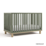 Sicily olive with driftwood crib with 2025 Storkcraft copyright on bottom right