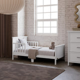 Bailey white toddler bed in kids room by window