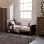 Bailey hazelnut toddler bed in kids room by window