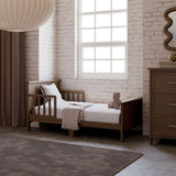 Bailey hazelnut toddler bed in kids room by window