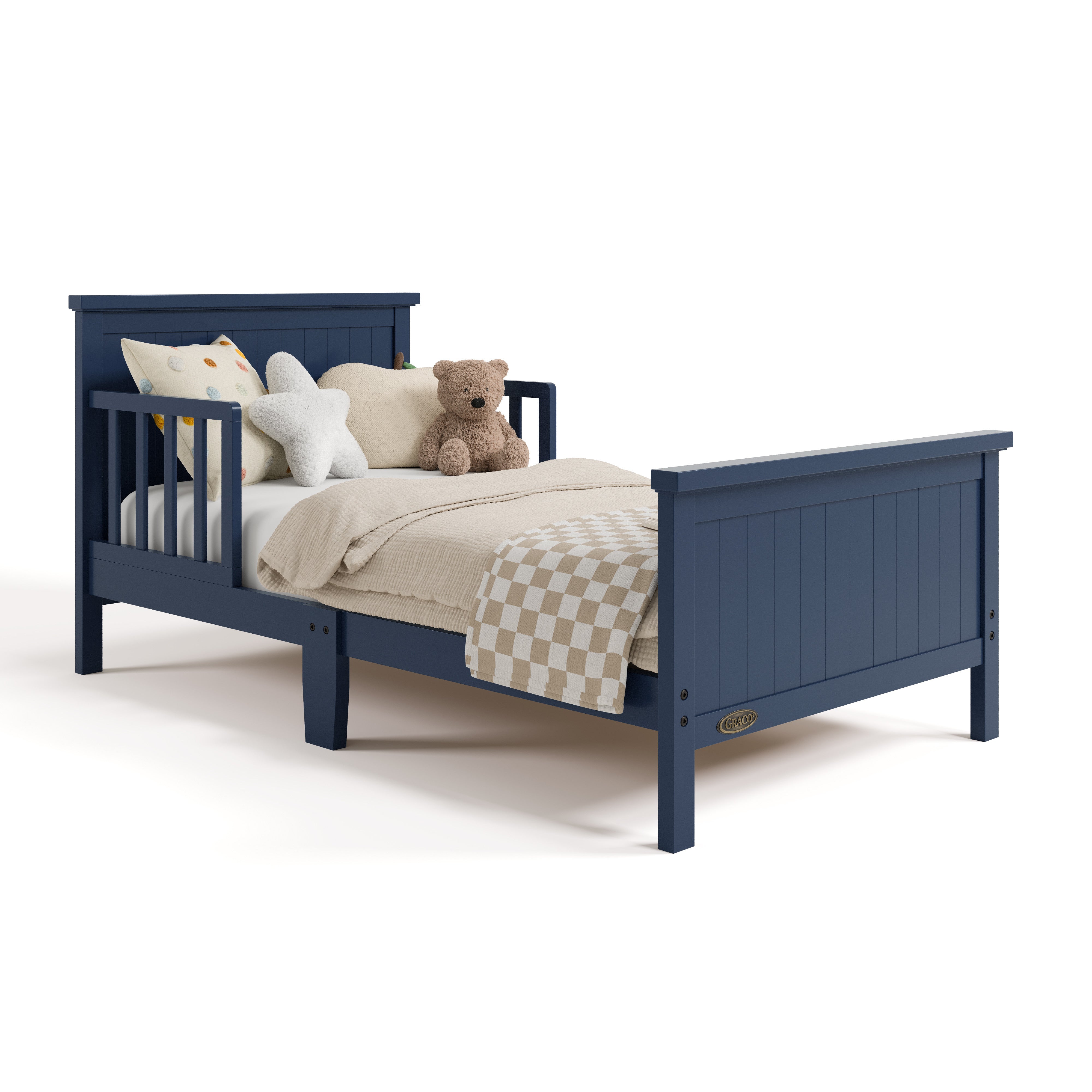 Bailey midnight blue toddler bed with bedding angle view