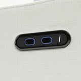 Teddi ivory basketweave power recliner close up of dual USB ports and push power buttons