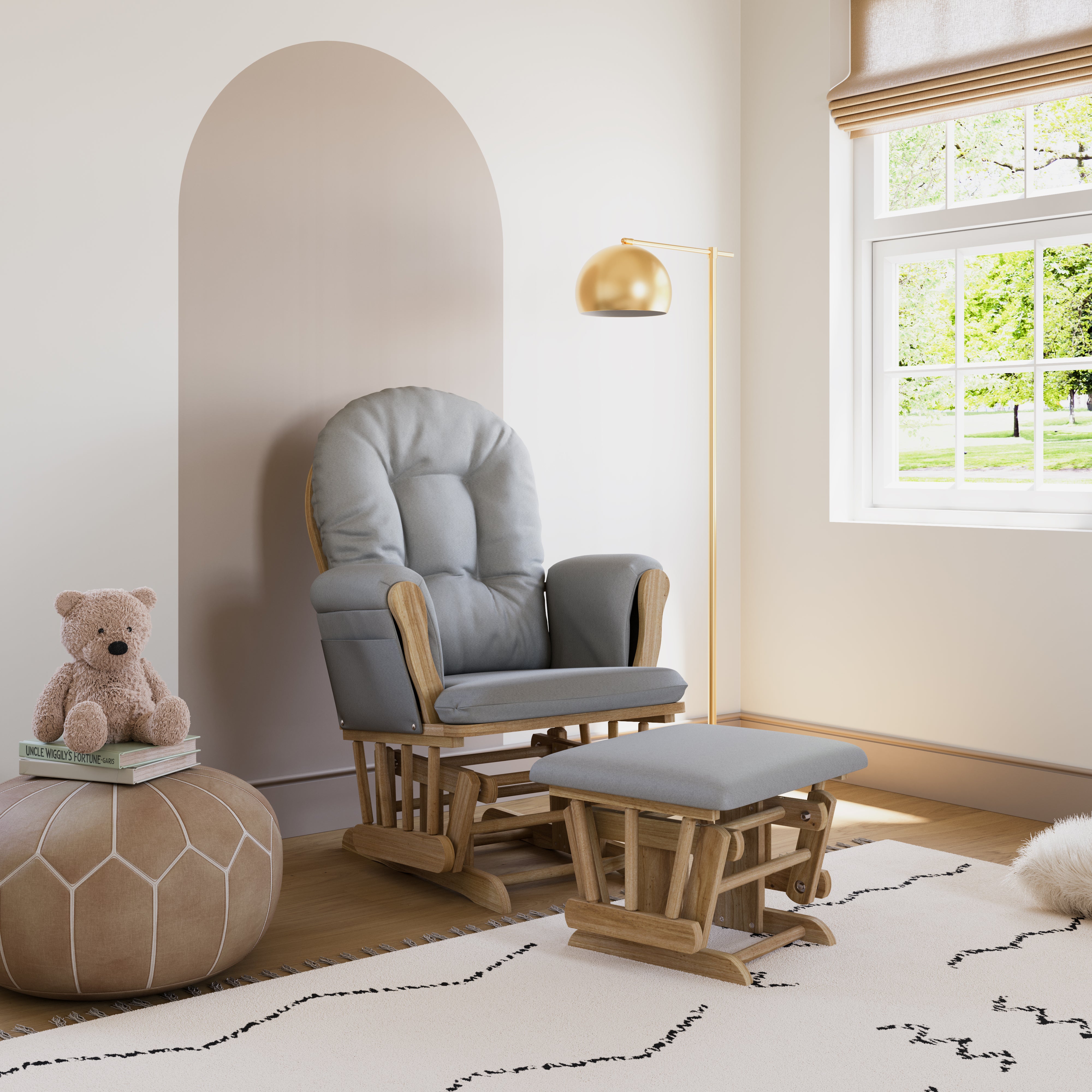hoop glider natural frame with light gray cushions in nursery